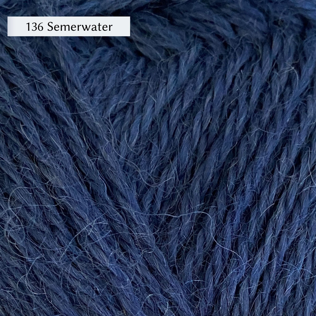 Wensleydale Longwool Aran, an aran weight yarn made from Wensleydale sheep, in color 136 Semerwater, a deep nautical blue