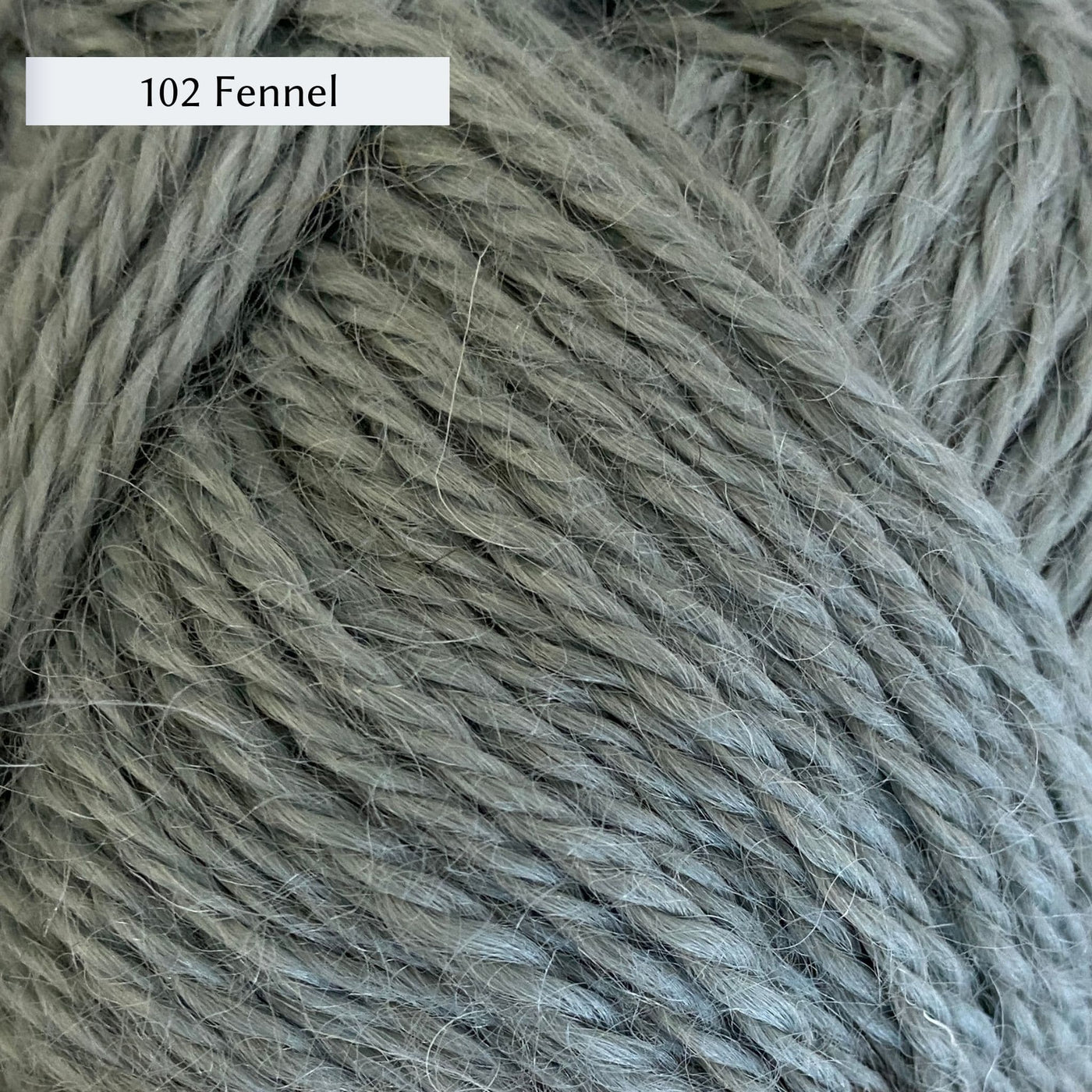 Wensleydale Longwool Aran, an aran weight yarn made from Wensleydale sheep, in color 102 Fennel, a blue-ish very light green
