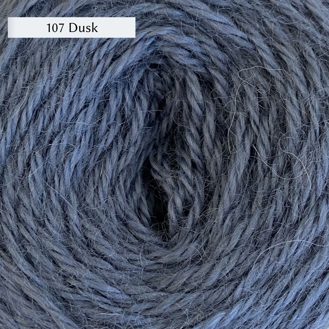 Wensleydale Longwool Aran, an aran weight yarn made from Wensleydale sheep, in color 107 Dusk, a dusty cornflower blue