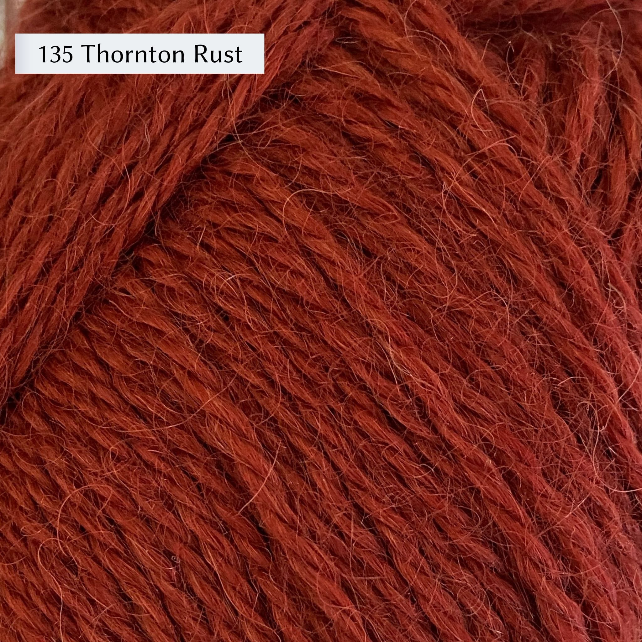 Wensleydale Longwool Aran, an aran weight yarn made from Wensleydale sheep, in color 135 Thornton Rust, a warm rusty red