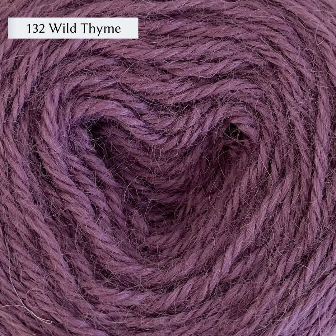 Wensleydale Longwool Aran, an aran weight yarn made from Wensleydale sheep, in color 132 Wild Thyme, a mid-tone dusty warm purple
