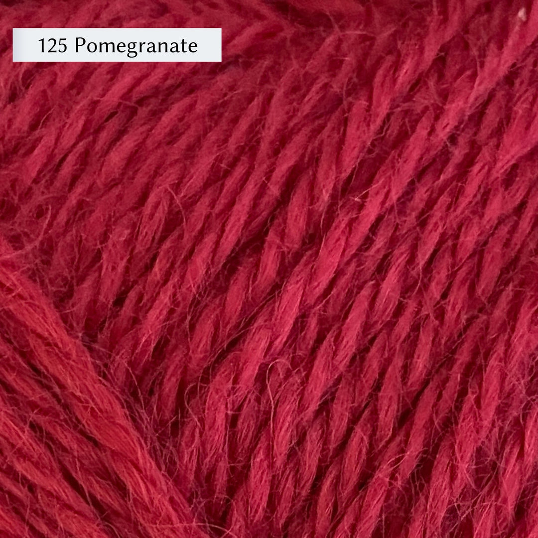 Wensleydale Longwool Aran, an aran weight yarn made from Wensleydale sheep, in color 125 Pomegranate, a rich red