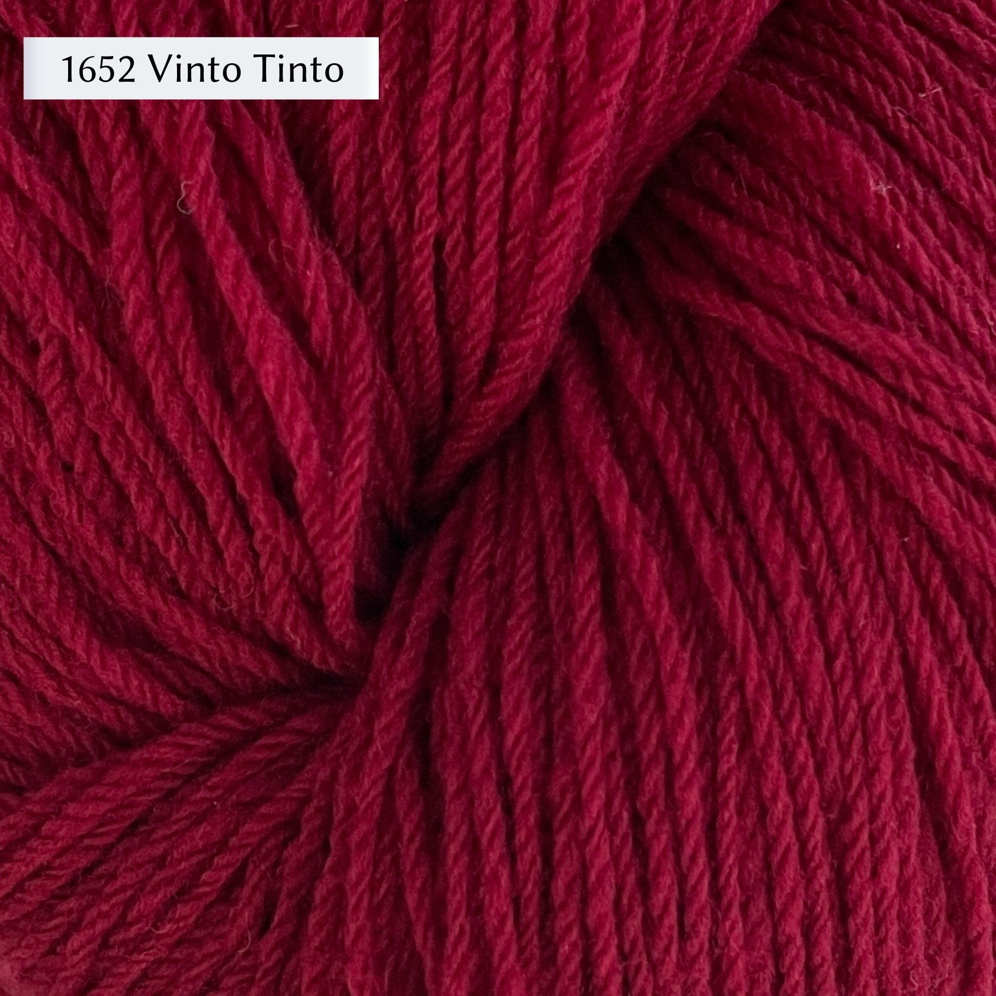 WoolDreamers Dehesa de Barrera, a fingering weight yarn, in color 1652 Vinto Tinto, a rich burgundy red