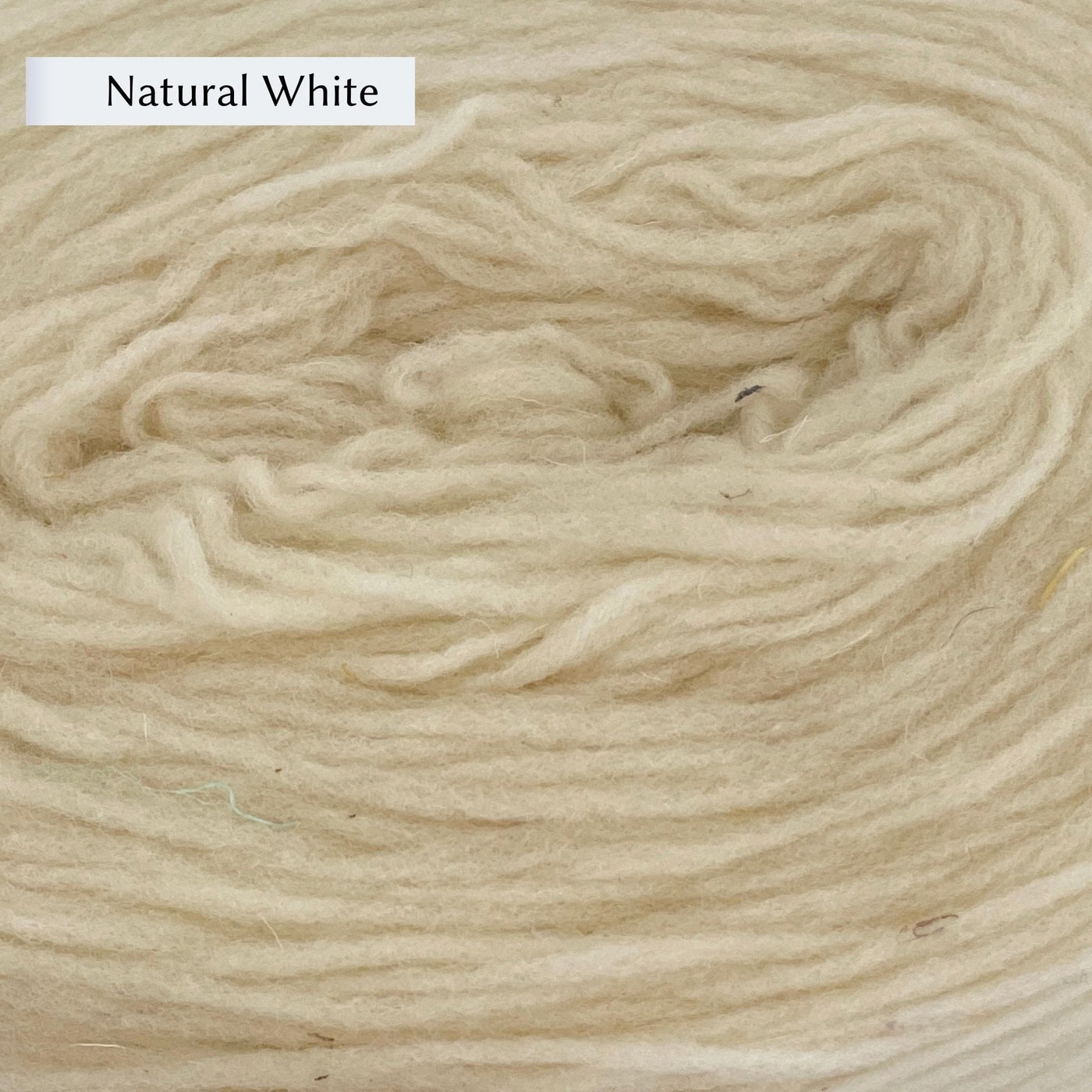 Manchelopis, a unspun yarn, in color Natural White, a warm cream