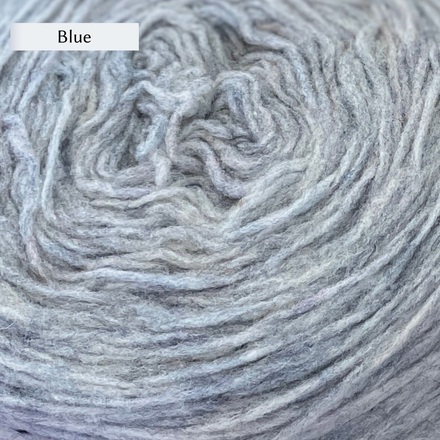 Manchelopis, a unspun yarn, in color Blue, a very light grey-blue