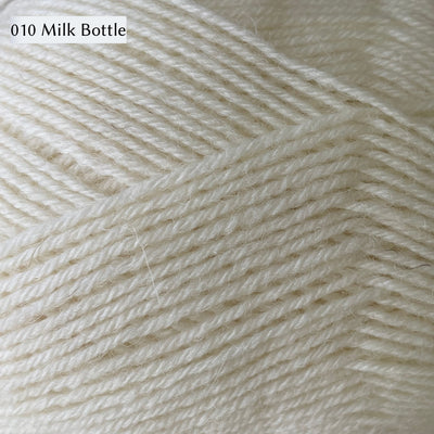 West Yorkshire Spinners Signature 4ply yarn, 100-gram ball, fingering weight, in color 010 Milk Bottle, a warm off-white