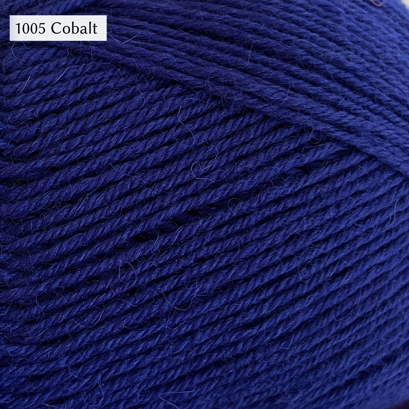 West Yorkshire Spinners Signature 4ply yarn, 100-gram ball, fingering weight, in color 1005 Cobalt, a saturated primary blue
