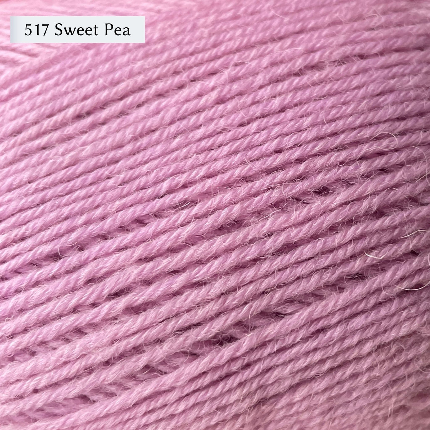 West Yorkshire Spinners Signature 4ply yarn, 100-gram ball, fingering weight, in color 517 Sweet Pea, a light ballet slipper pink