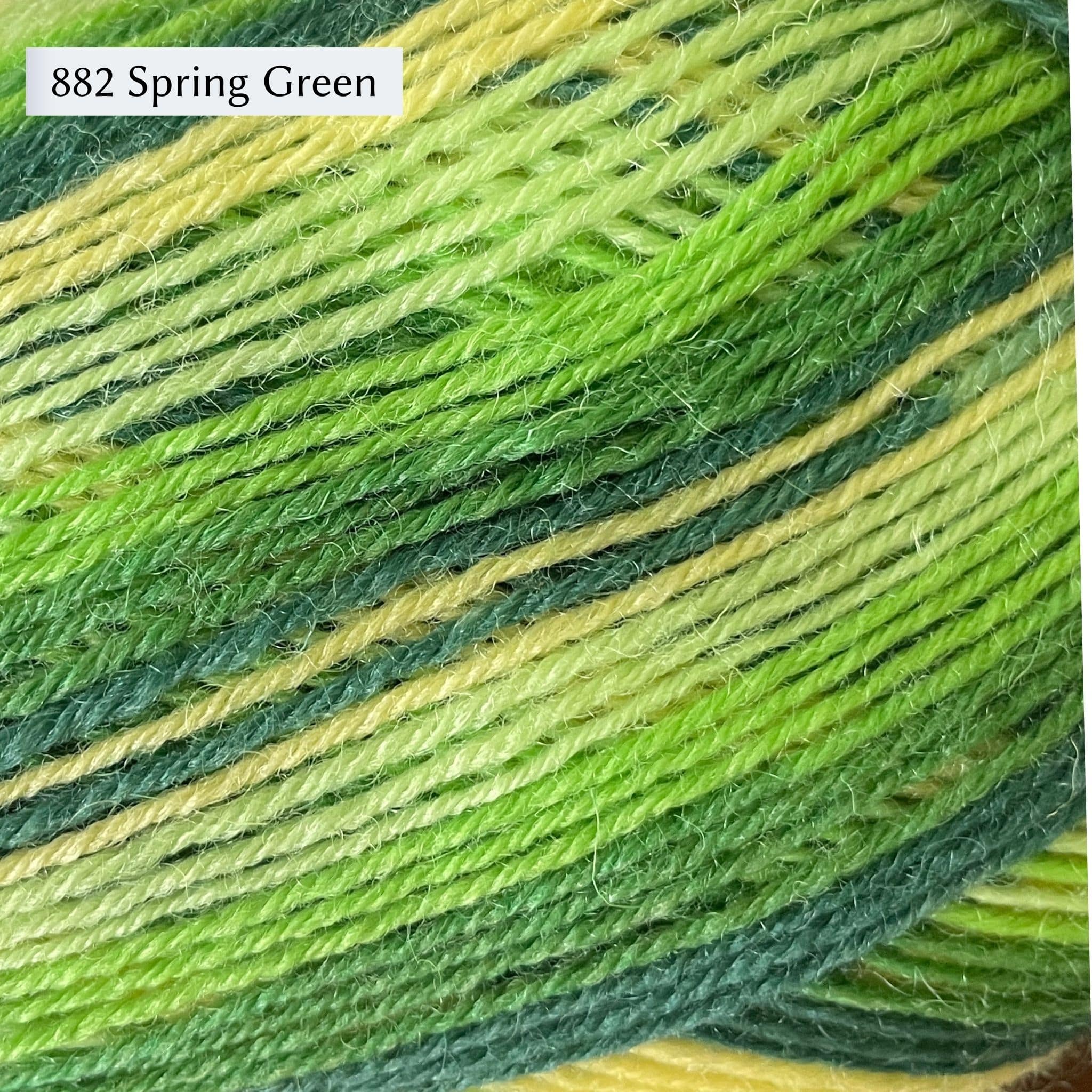West Yorkshire Spinners Signature 4ply yarn, fingering weight, in color 882 Spring Green, a striping colorway in shades of green including light grass green, lime, kelly green, and forest green