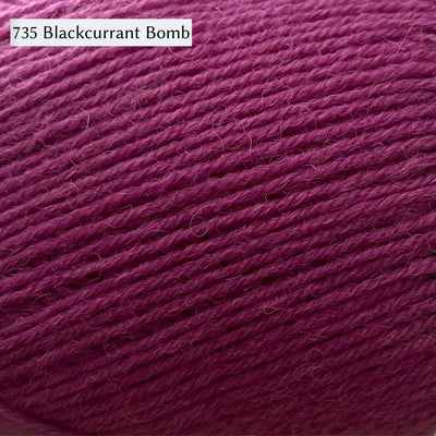West Yorkshire Spinners Signature 4ply yarn, 100-gram ball, fingering weight, in color 735 Blackcurrant Bomb, a deep raspberry red-purple