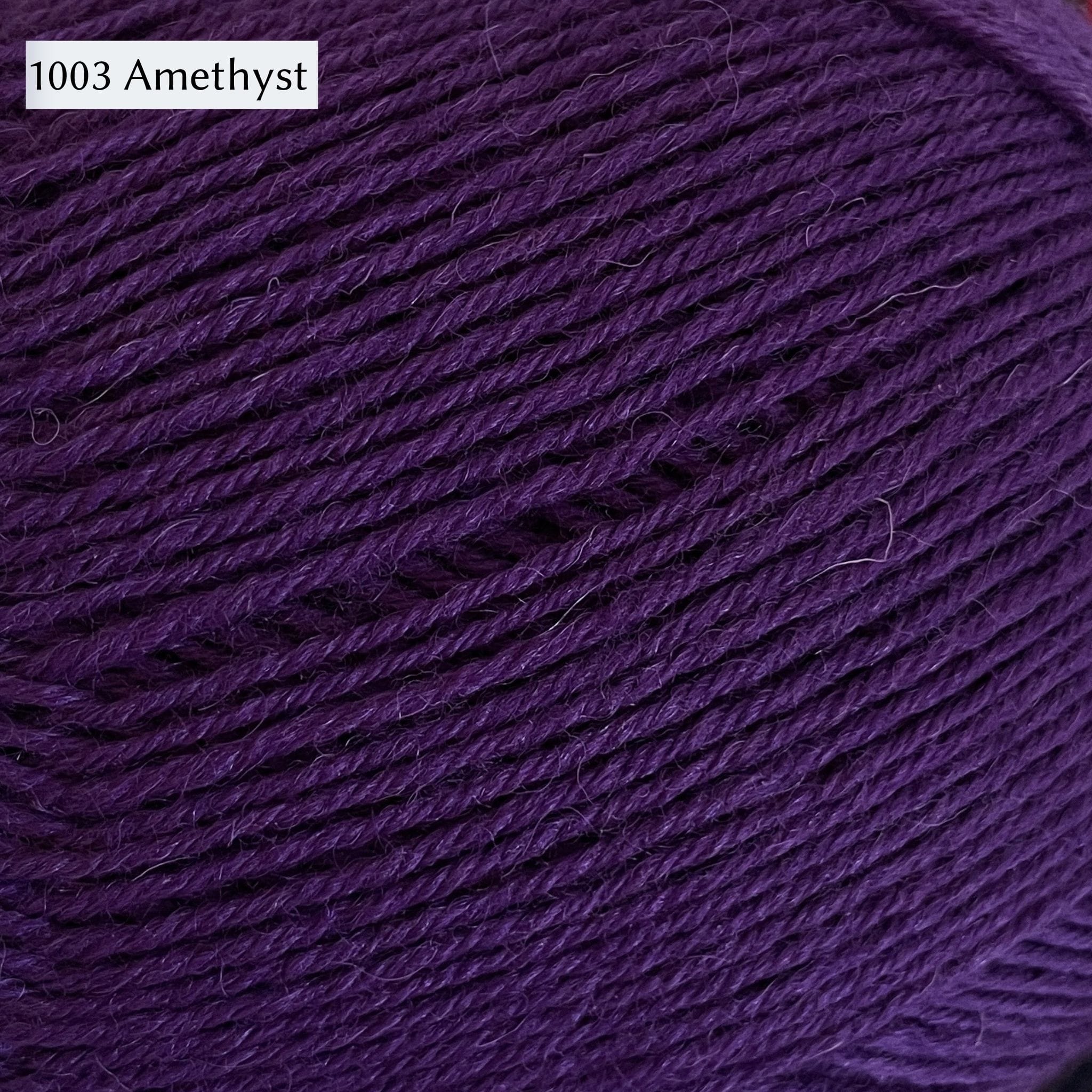 West Yorkshire Spinners Signature 4ply yarn, 100-gram ball, fingering weight, in color 1003 Amethyst, a deep royal purple